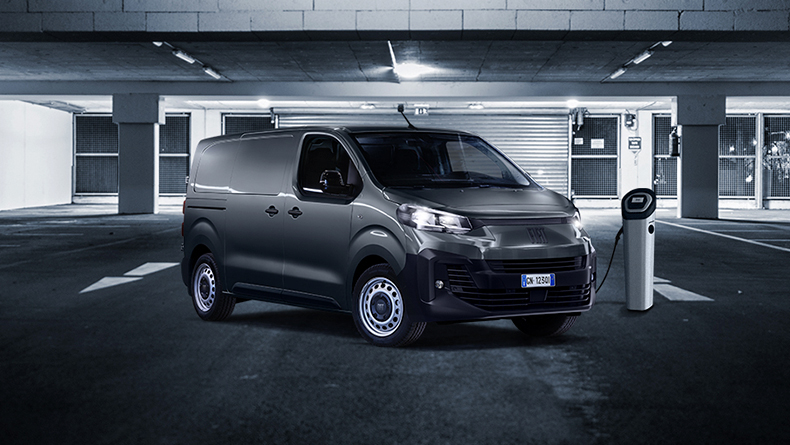 Fiat commercial vehicle parked next to charging station